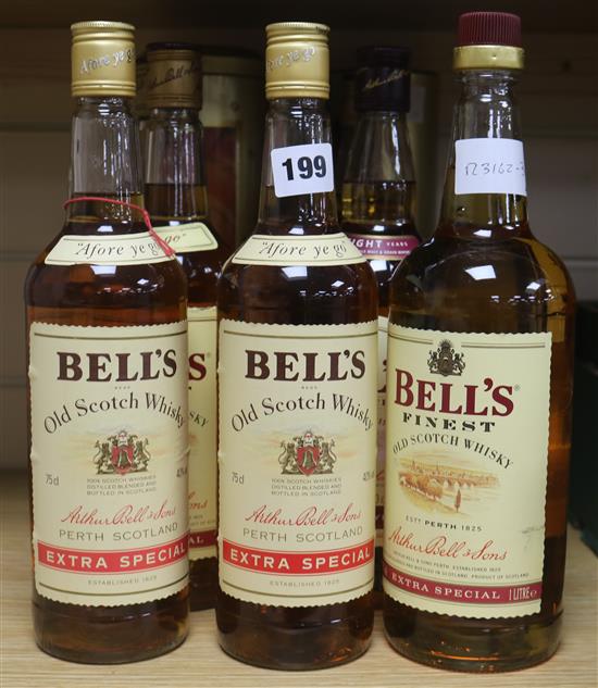 Bells 8 year old whisky (3 in box), 2 x Bells Extra Special whisky, and 1 x litre Bells Extra Special Whisky